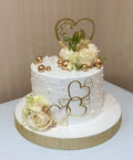 Elegant White & Gold Floral Heart Cake